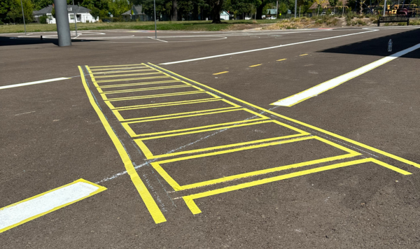 A crosswalk painted on the ground