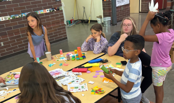 Kids at a table doing crafts
