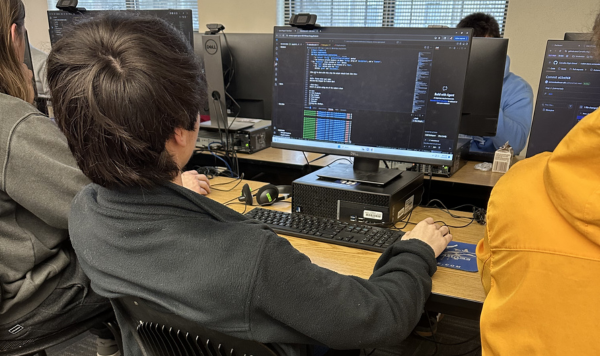 Student working on computer code