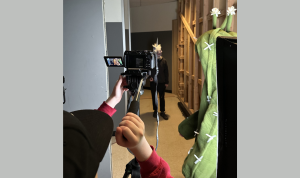 Students filming a scene