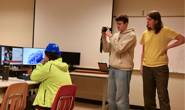 Students filming a scene
