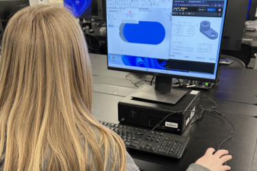 Student using 3D modeling software