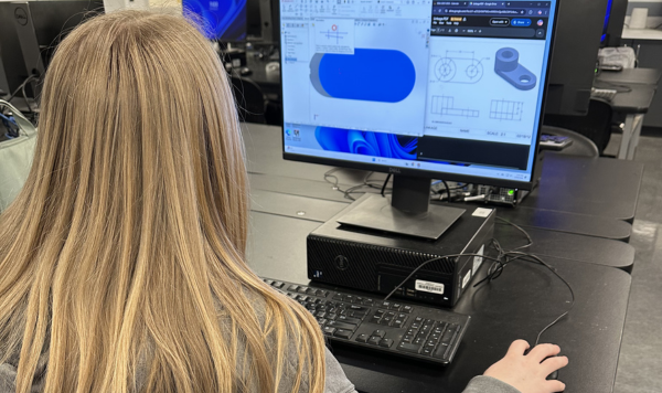 Student using 3D modeling software