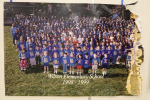 Students and staff in a field
