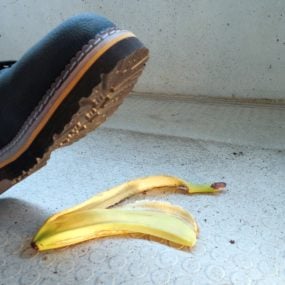 Close up of boot about to step on a banana peel